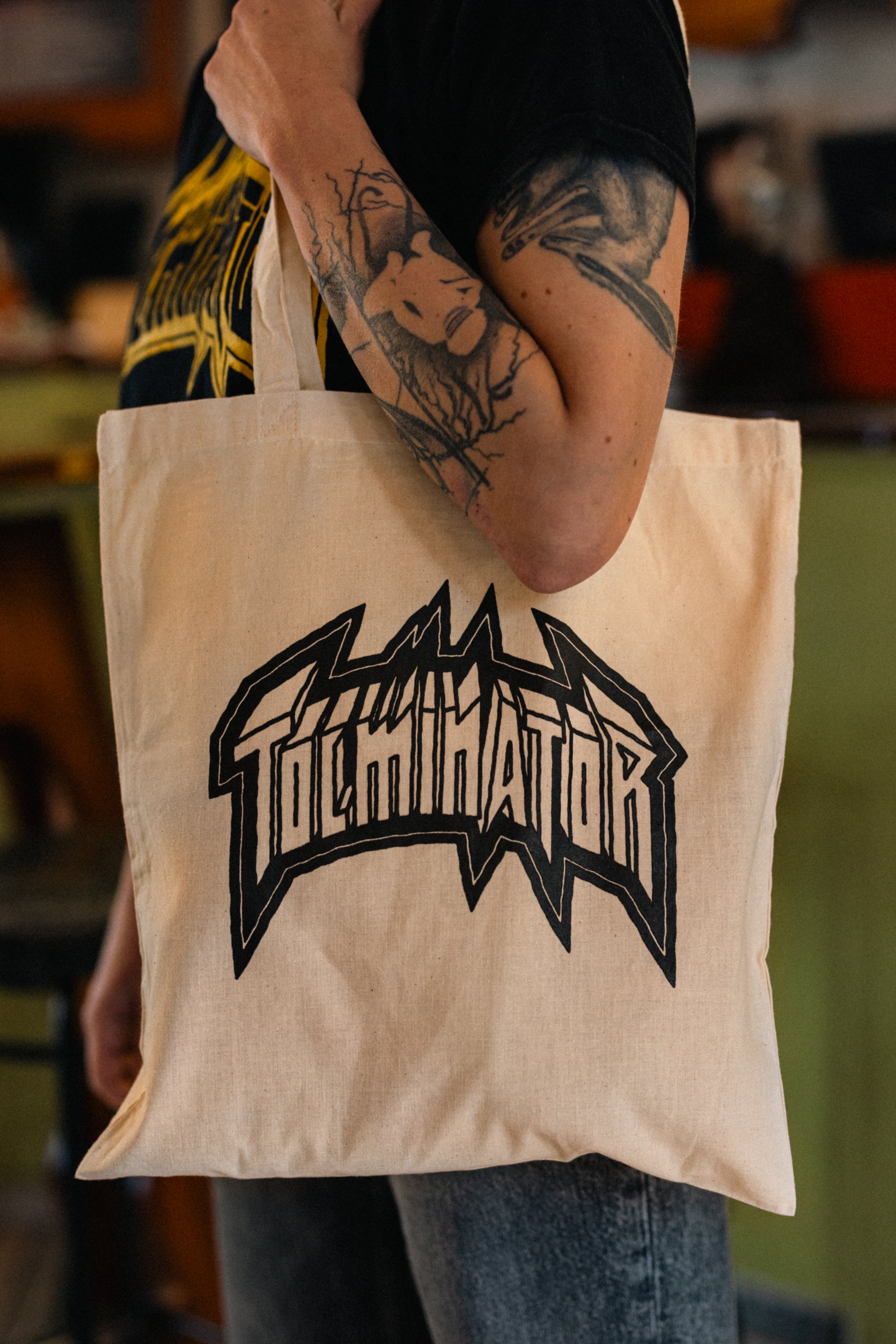 Logotip Tolminator - rjava torba